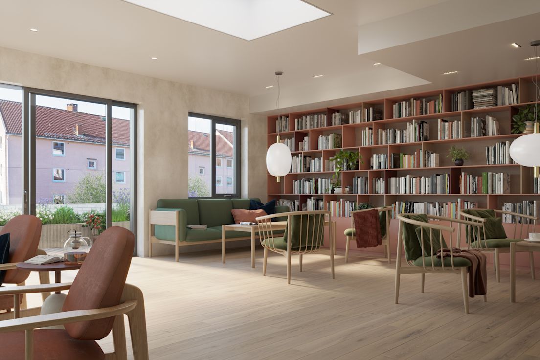 Illustrasjonstegning av et bibliotek med sitteplasser i boligprosjektet Bølgelengden