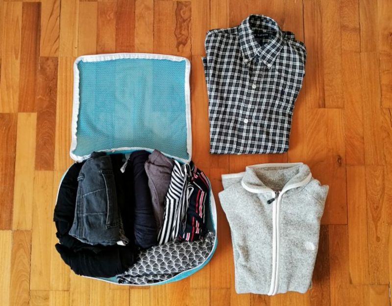 Picture of packing list titled: Minimalist Packing List from a Female One Bagger