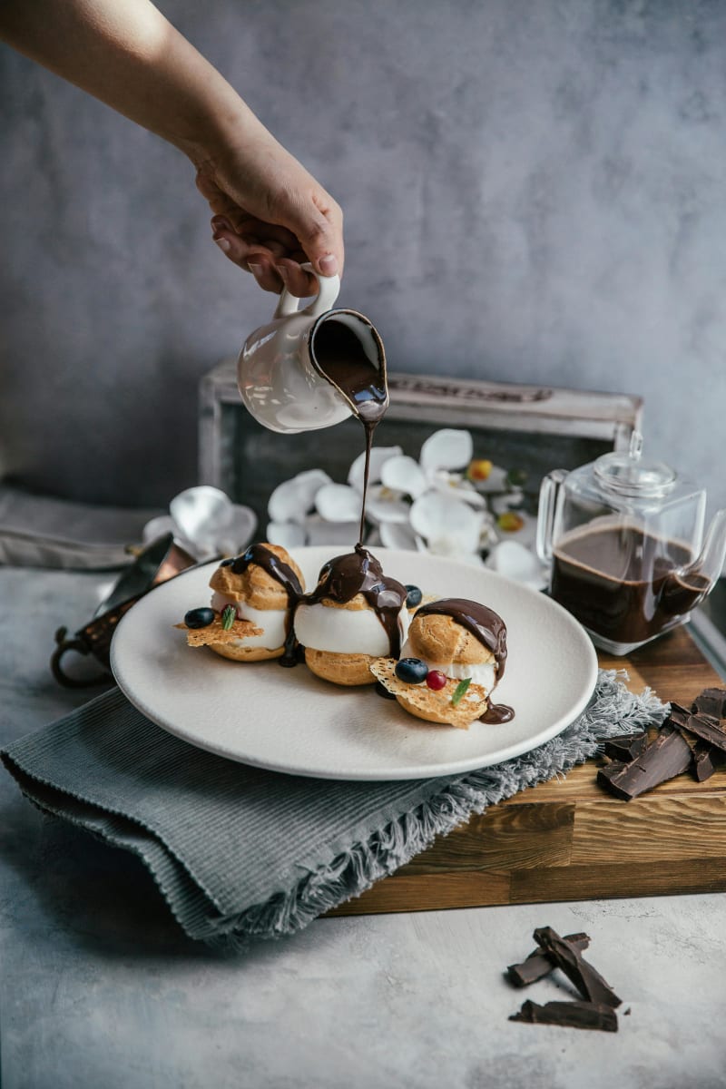 French Pastry - Profiteroles And Eclairs Photo