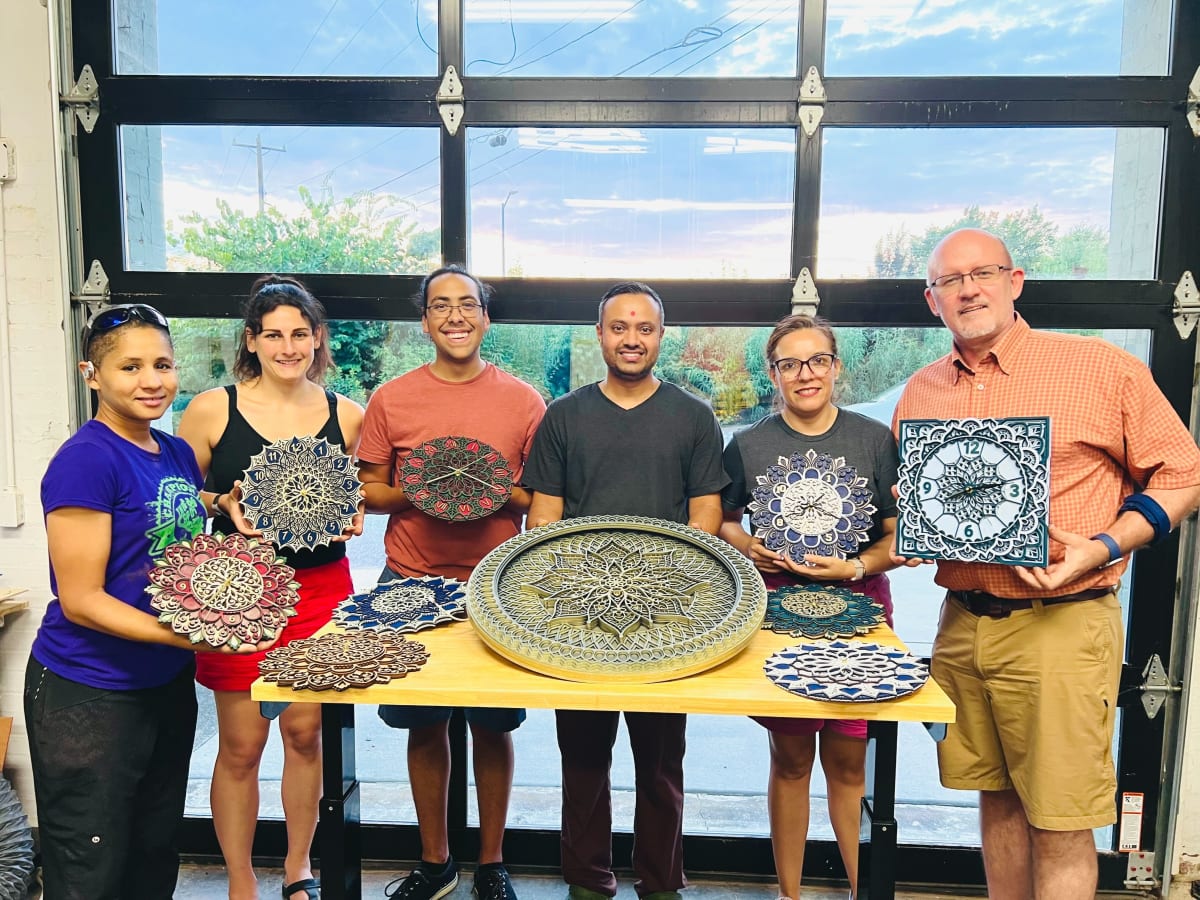 Create a Layered Mandala Wall Clock – Laser Cutting Party Photo