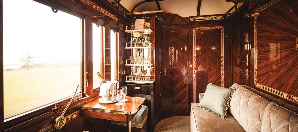 A sofa with a view inside the Venice-Simplon-Orient-Express