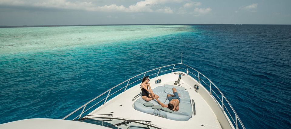 The yacht at Four Seasons Maldives Private Island at Voavah 