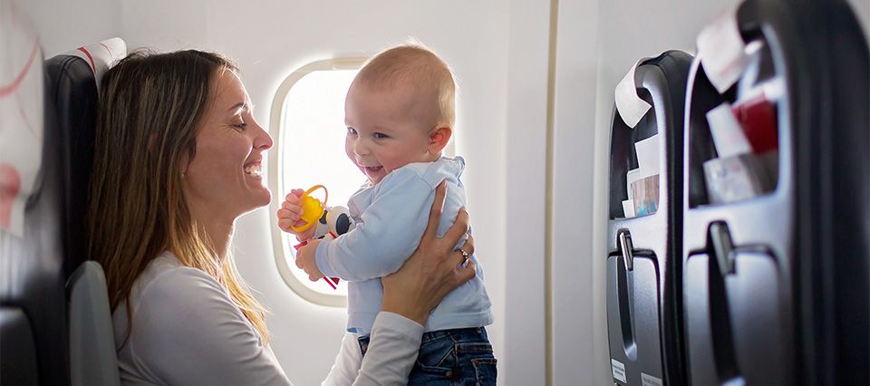 baby on plane with mum