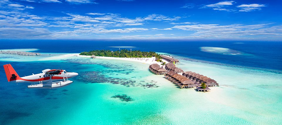 Sea plane arriving into Maldives island