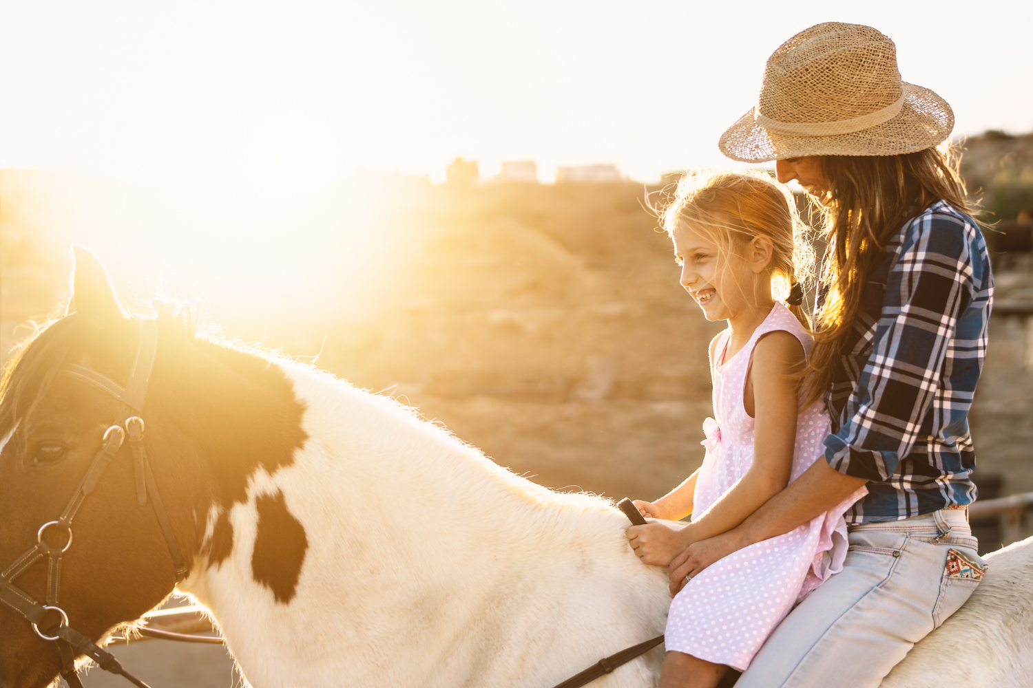 Mother and daughter horse riding in Florida