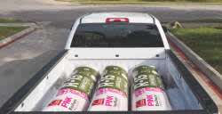 Owens Corning R-15 insulation in the back of white truck