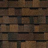 TruDefinition Duration STORM  Brownwood shingles have an overall color of brown that is achieved by a mix of dark brown, light brown, black and golden tan granules.