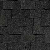 Woodmoor Carbon shingles have an overall color of black that is achieved through a mix of dark gray and black granules.