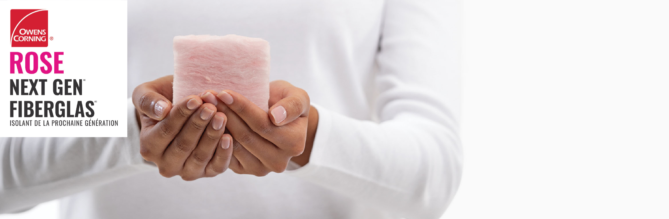 hands holding a small piece of next gen fiberglas