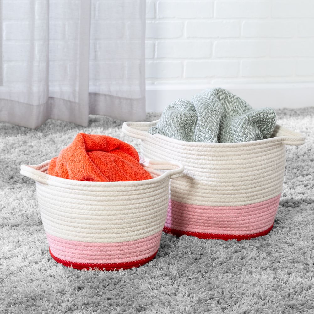 https://res.cloudinary.com/ocm/image/upload/c_scale/v1679497661/wws/products/set-of-2-nested-cotton-baskets-with-handles-pink-2148254955-1.jpg