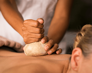 Massagem com Pindas | Clínica Cristina Reis Massagem com Pindas | Clínica Cristina Reis