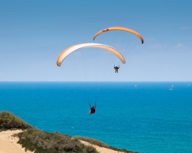 Voo de Parapente para 2 na Arrábida Voo de Parapente para 2 na Arrábida