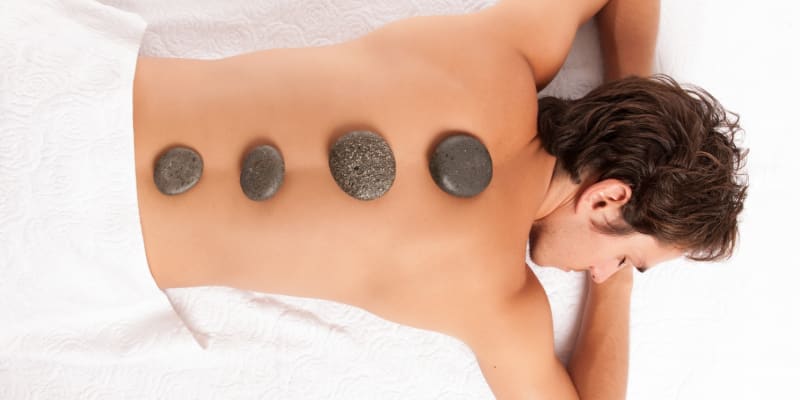 Massagem de Pedras Quentes Localizada 50 Minutos Para Ele | Oporto Medical Spa
