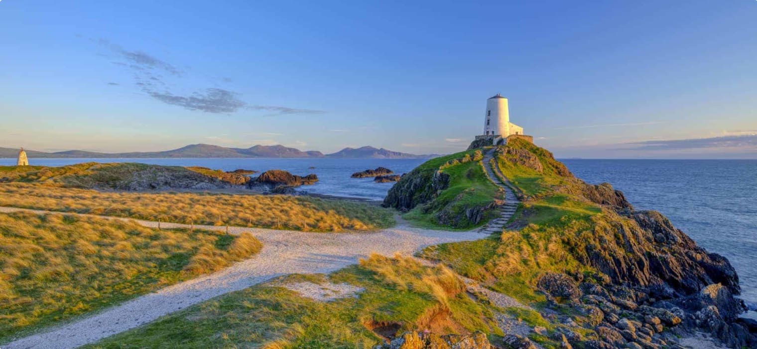 Twr Mar Lighthouse on Llanddwyn Island off Anglesey, Wales UK