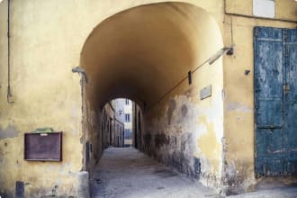 archway in Cortona, Tuscany Italy