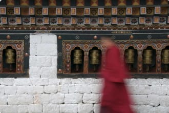 Paro, Bhutan, monk, prayer wheels