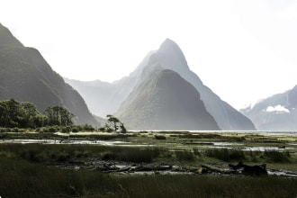 Milford Sound fjord and Mitre Peak at low tide