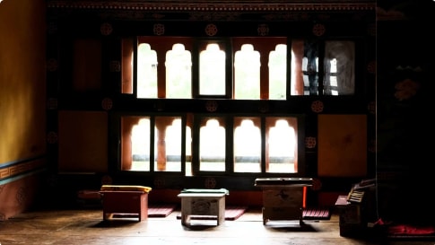 Room with Tibetan style desk in Chimi Lhakhang (Monastery of Fertility) in Bhutan