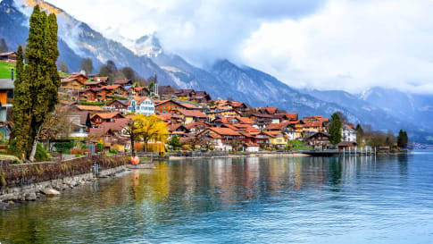 Old town and Alps mountains on Brienzer Lake, Switzerland