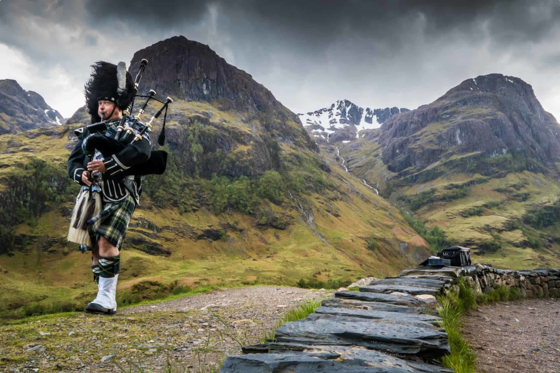 Bagpipe player in the Highlands, Scotland