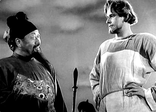 A still from the film Alexander Nevsky by Sergey Eisenstein. Alexander Nevsky (Nikolay Cherkasov, right) speaking to the Mongol envoy (Liang Qung, left). 