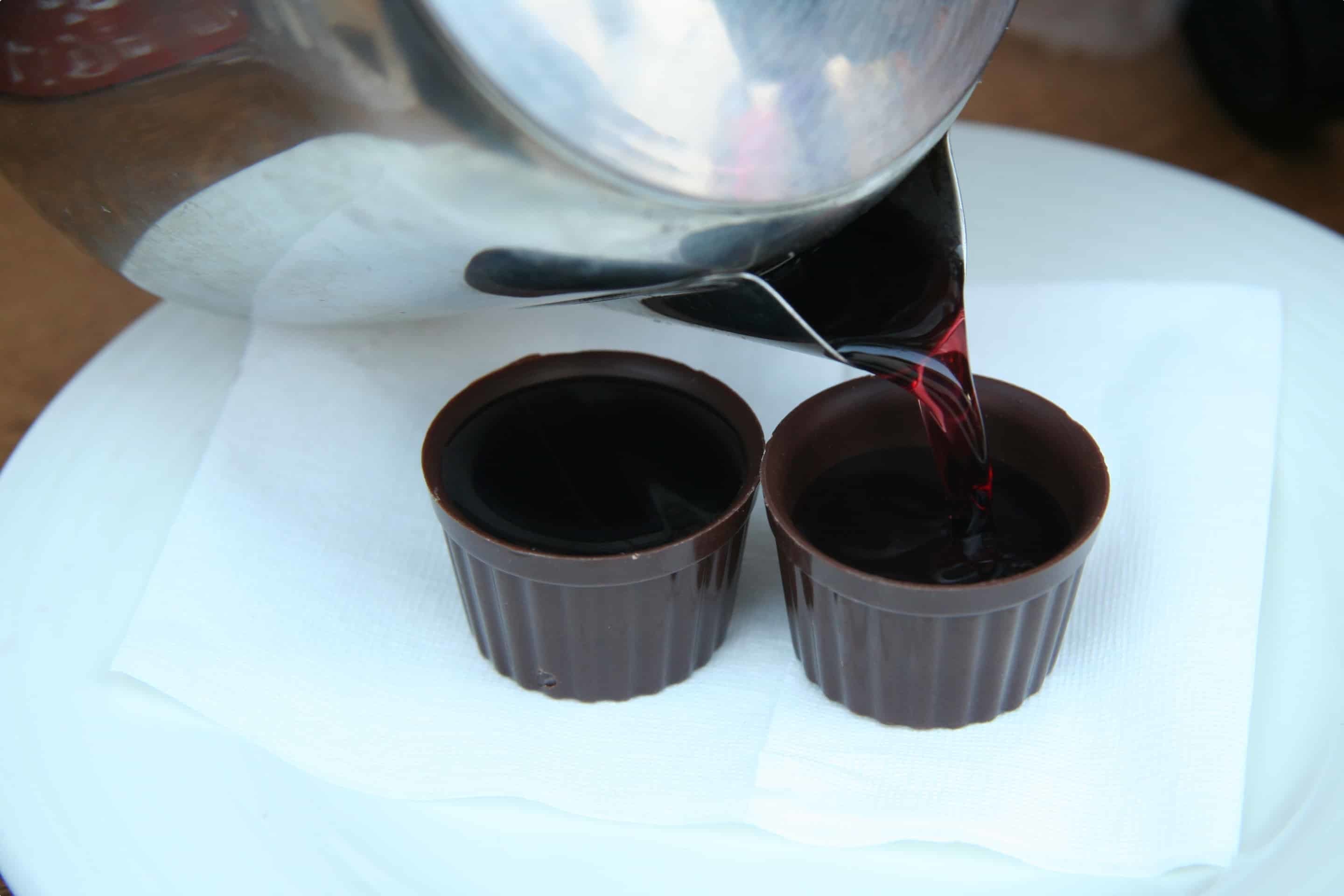 Ginja being served in chocolate cups 