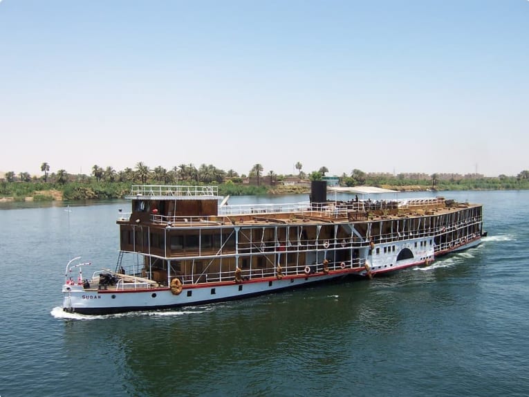 A boat cruises down the Nile