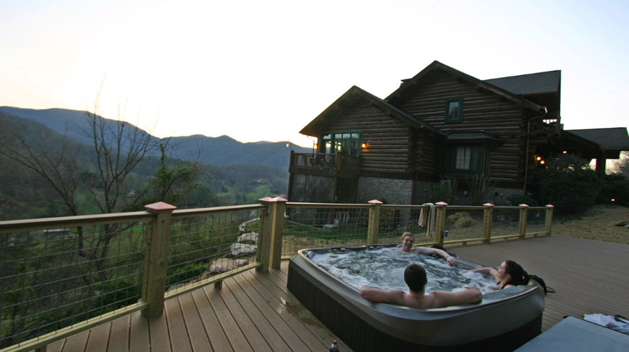 The outdoor jacuzzi at the Wildberry Lodge overlooks the mountain valleys. 