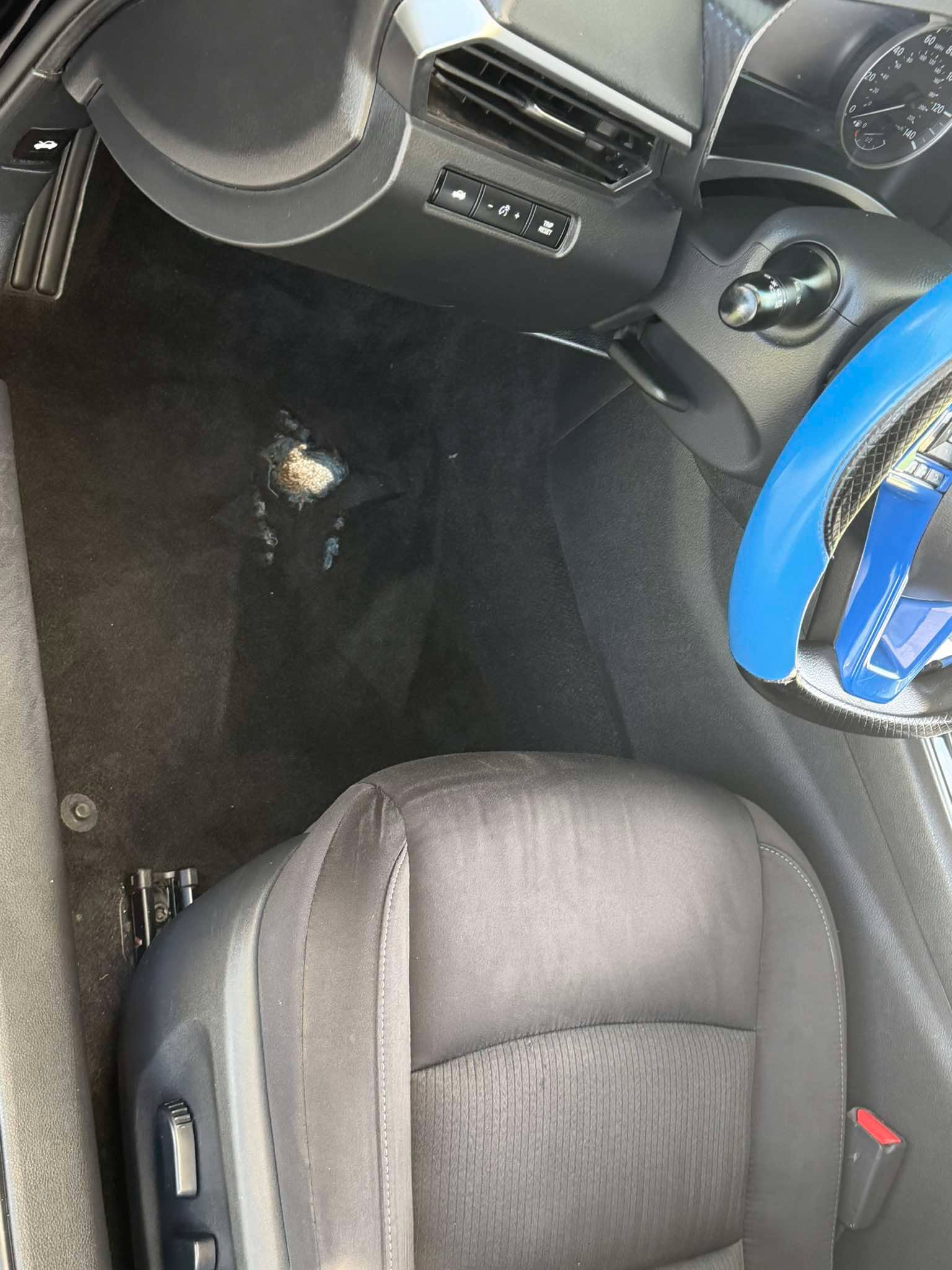 Torn Carpet - Driver Footwell