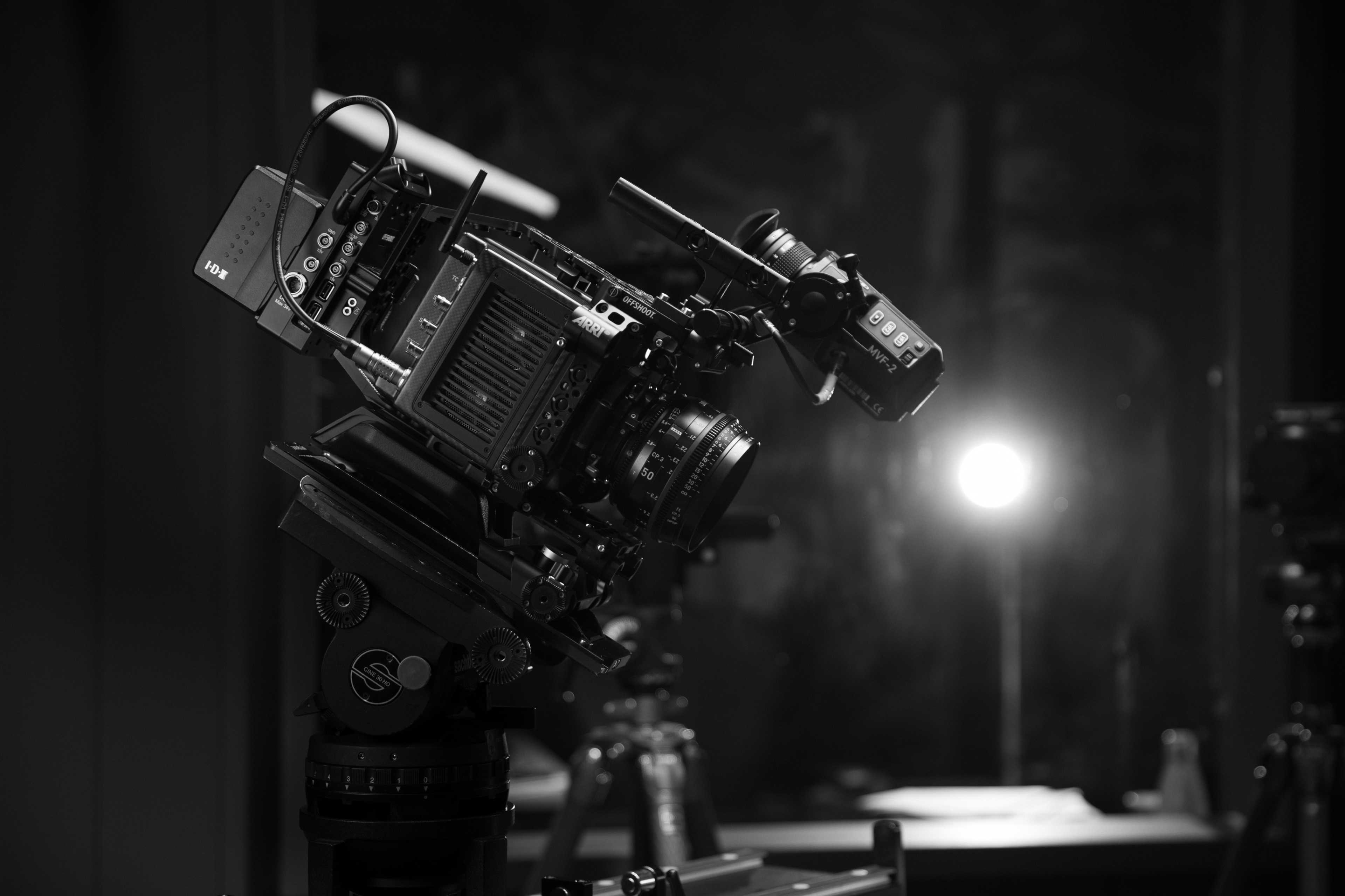 ARRI Alexa Mini LF camera with a 50mm Zeiss CP.3 lens, supported by a Sachtler Cine 30 head on a Ronford Baker slider and bazooka.