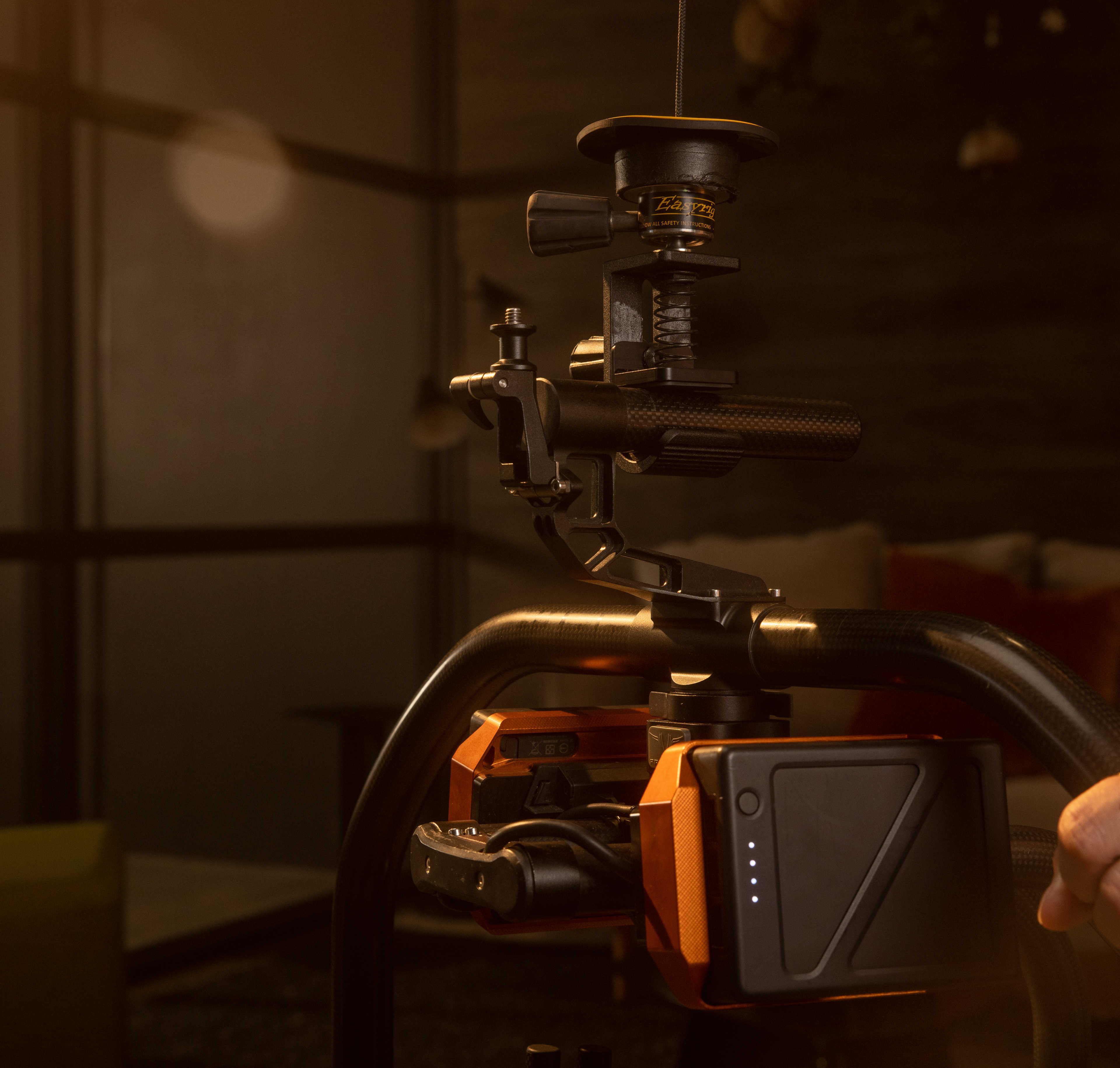 A quick release hook is included for attachment to camera handles etc.
