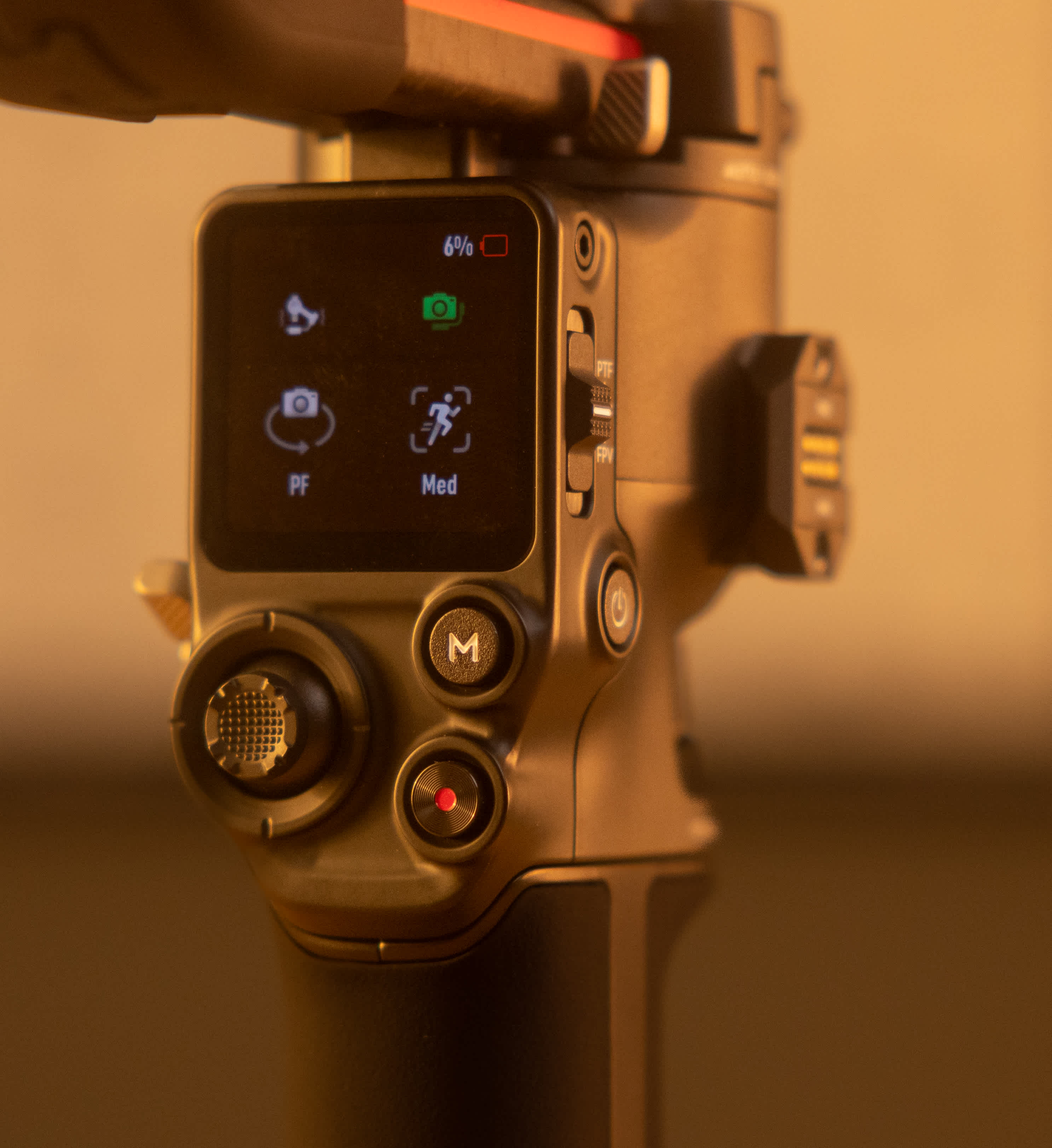 The OLED touchscreen and various control buttons on the RS 3 Pro,.