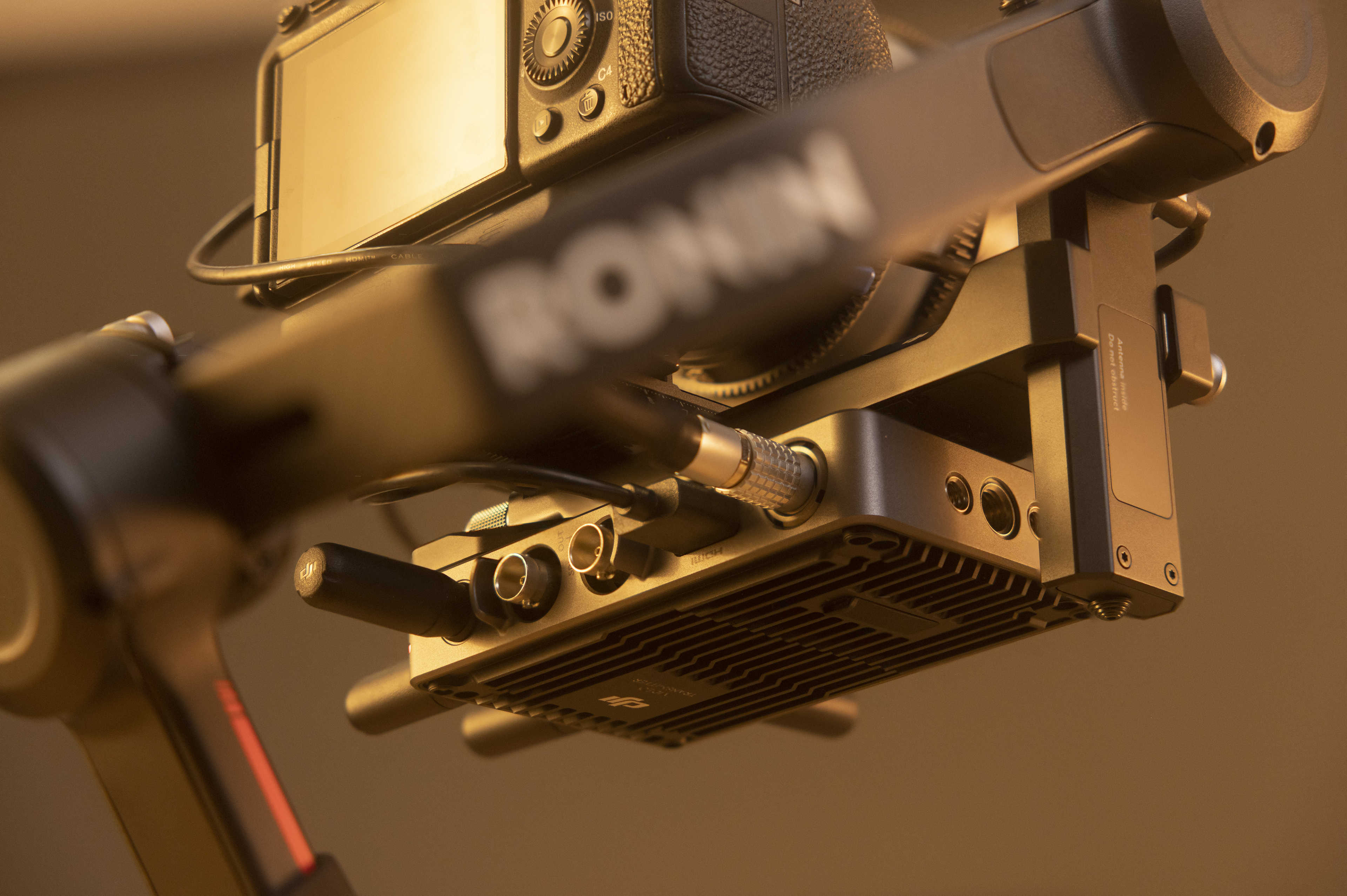 The transmitter from the DJI Transmission system mounted on a DJI Ronin RS 3 Pro gimbal.