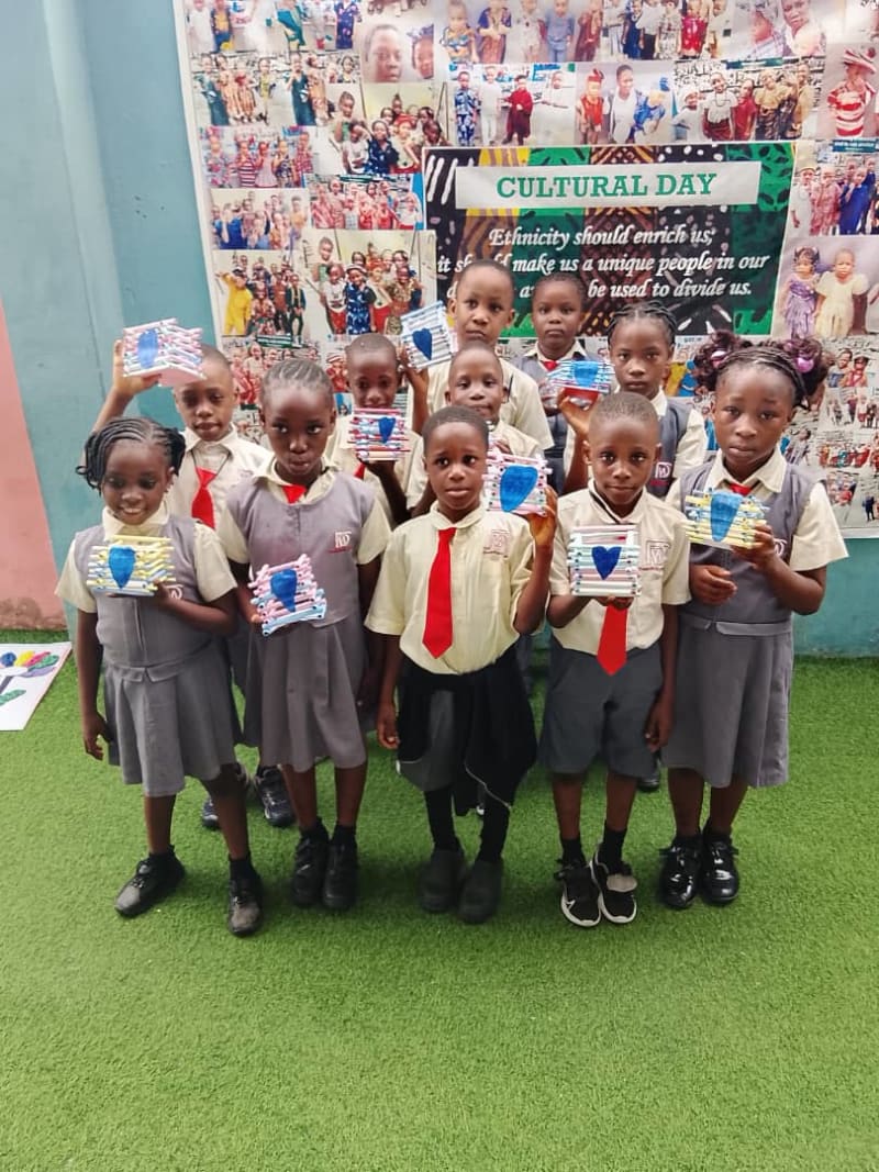 Pupils showing their Cultural Day crafts