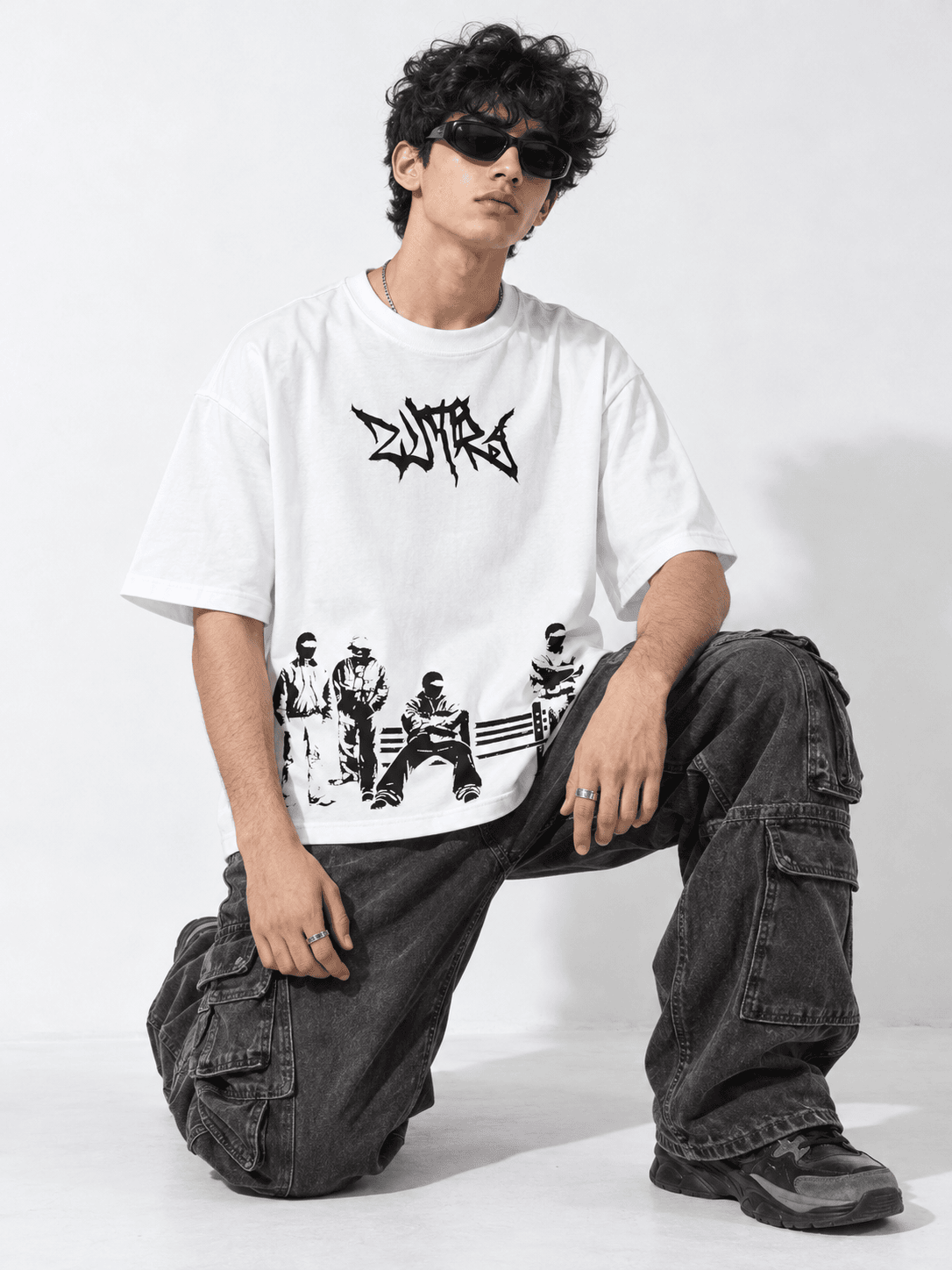 Outlaw Drop Shoulder Tee on heavyweight 240 GSM drop-shoulder oversized tee — front graphic view