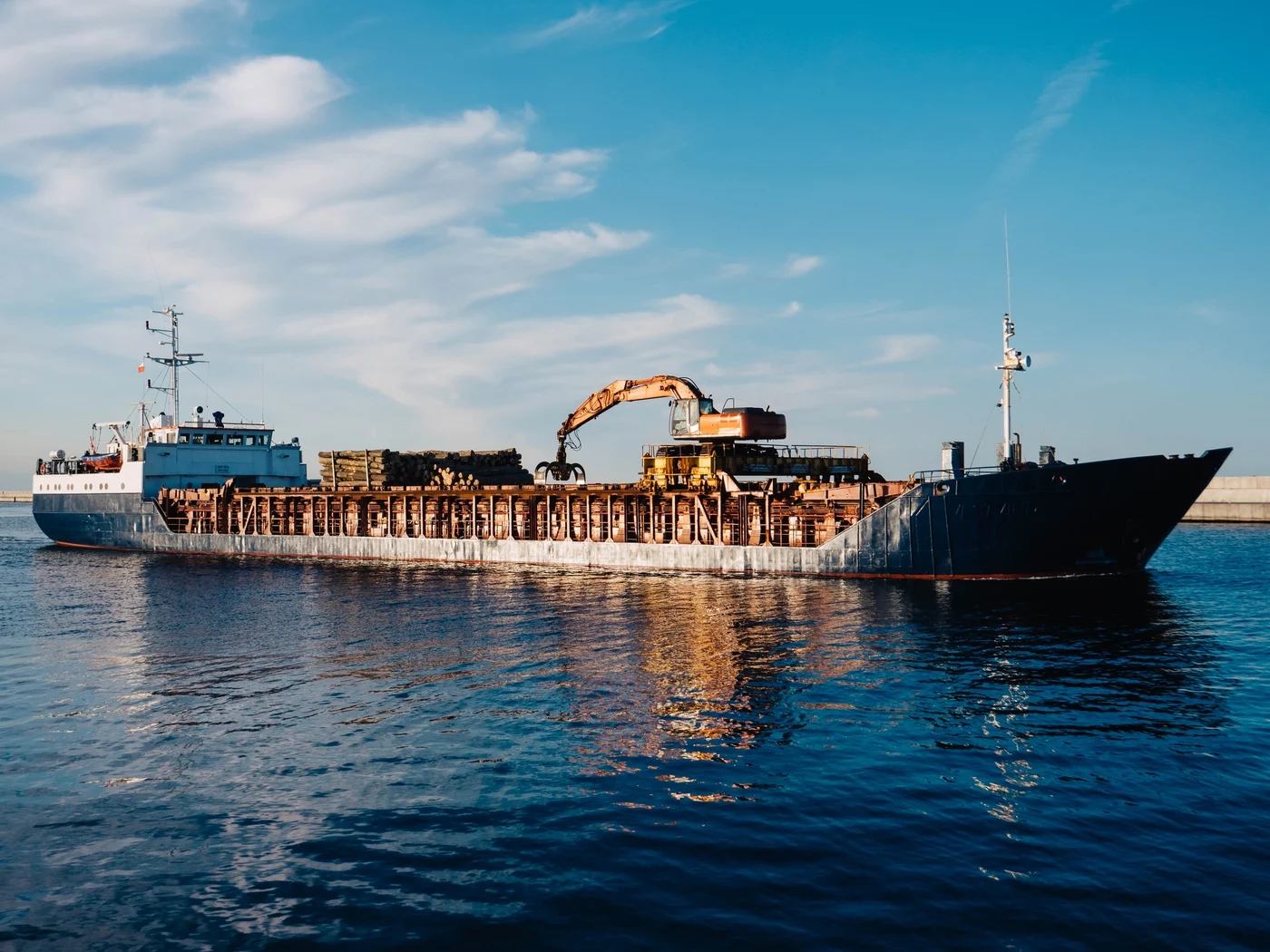 An image of a brown and black ship cruising by @kowalikus on unsplash.