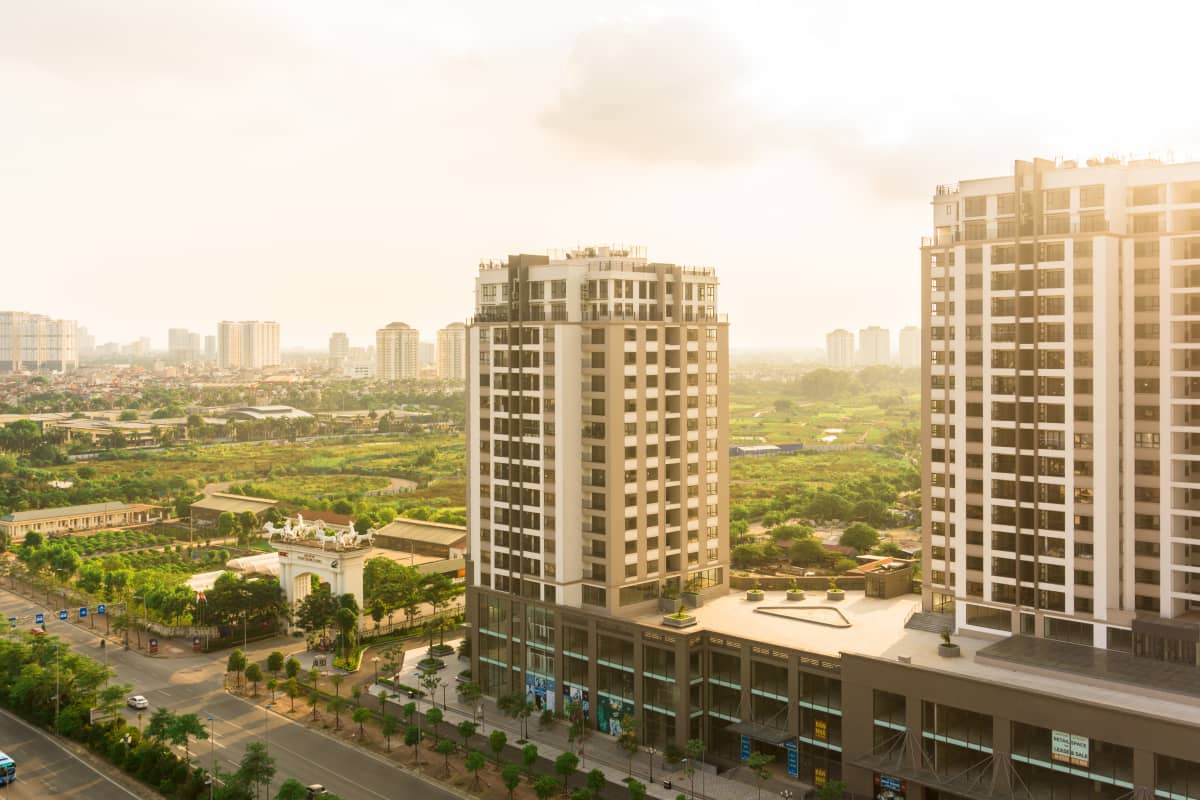Apartment buildings in the distance, from a high vantage point.