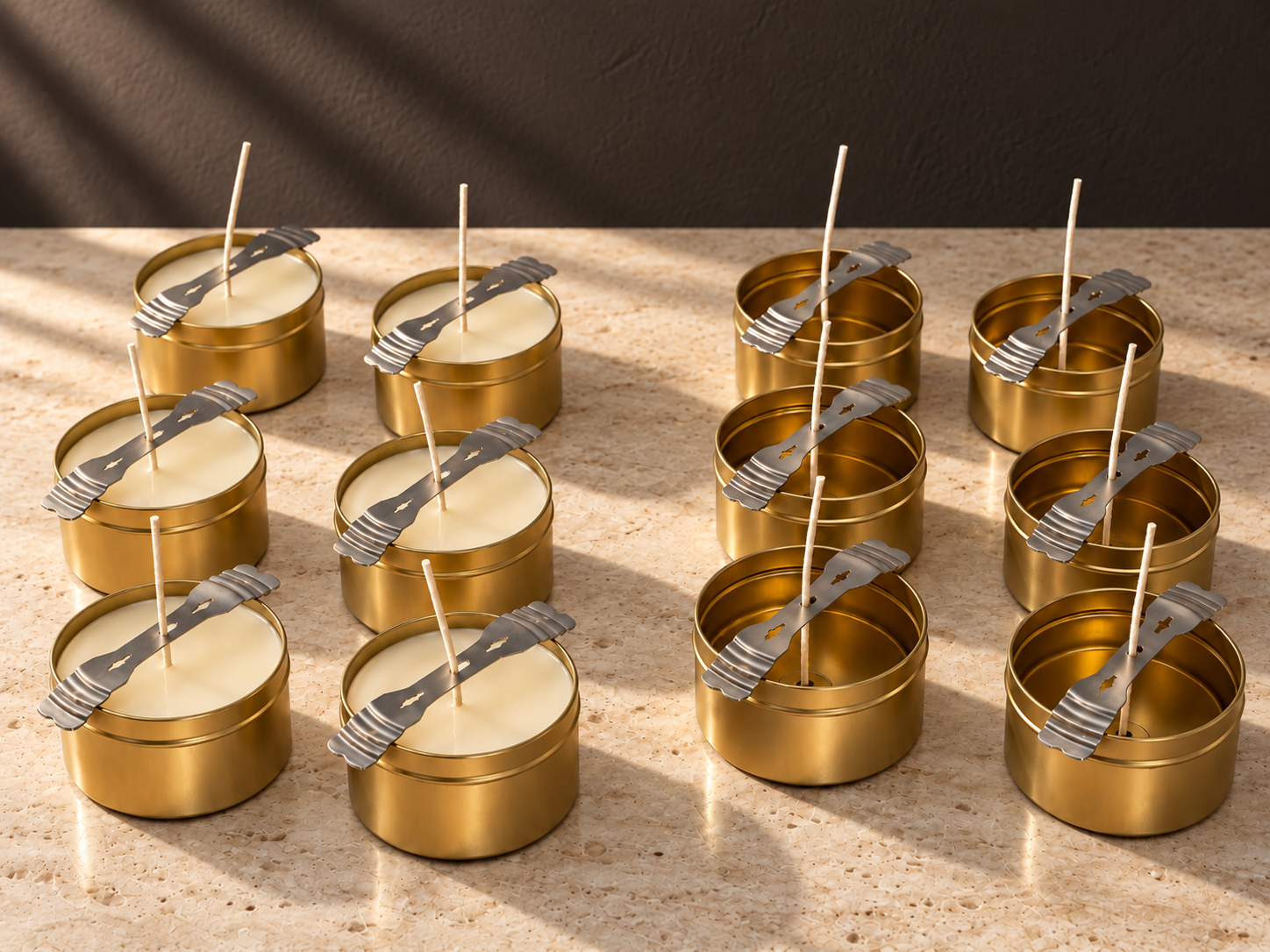ALLEGRE luxury coconut-soy candles being handcrafted in small batches, with gold candle tins, creamy wax, and centered wicks secured by metal holders during the hand-poured candle-making process in San Diego.