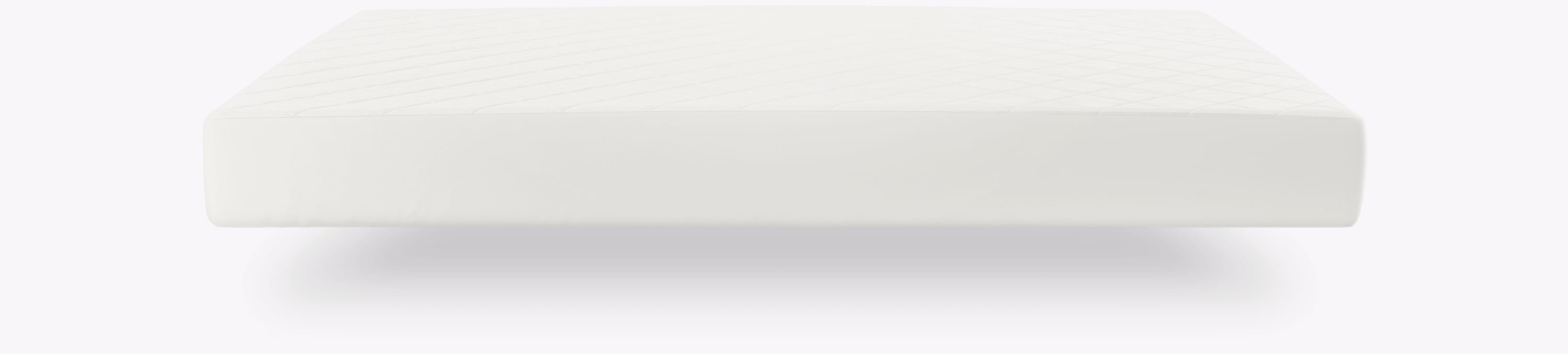 Sideways view of a mattress floating and covered with Onebed Protector and soft white clould floating abote it