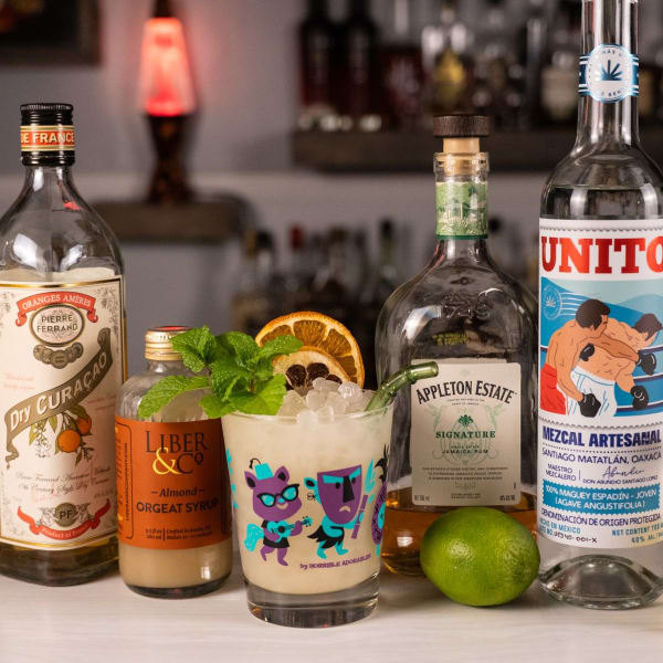 Tia Mia, a mezcal Mai Tai riff, over pebble ice with mint