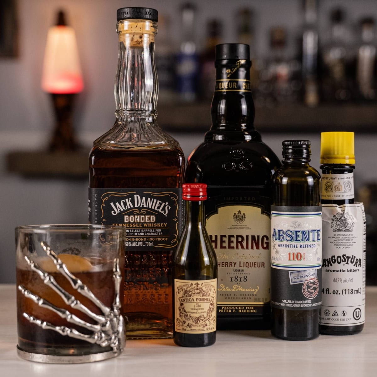 All Work and No Play, a Shining cocktail with Jack Daniel's Bonded in a skeleton hand glass