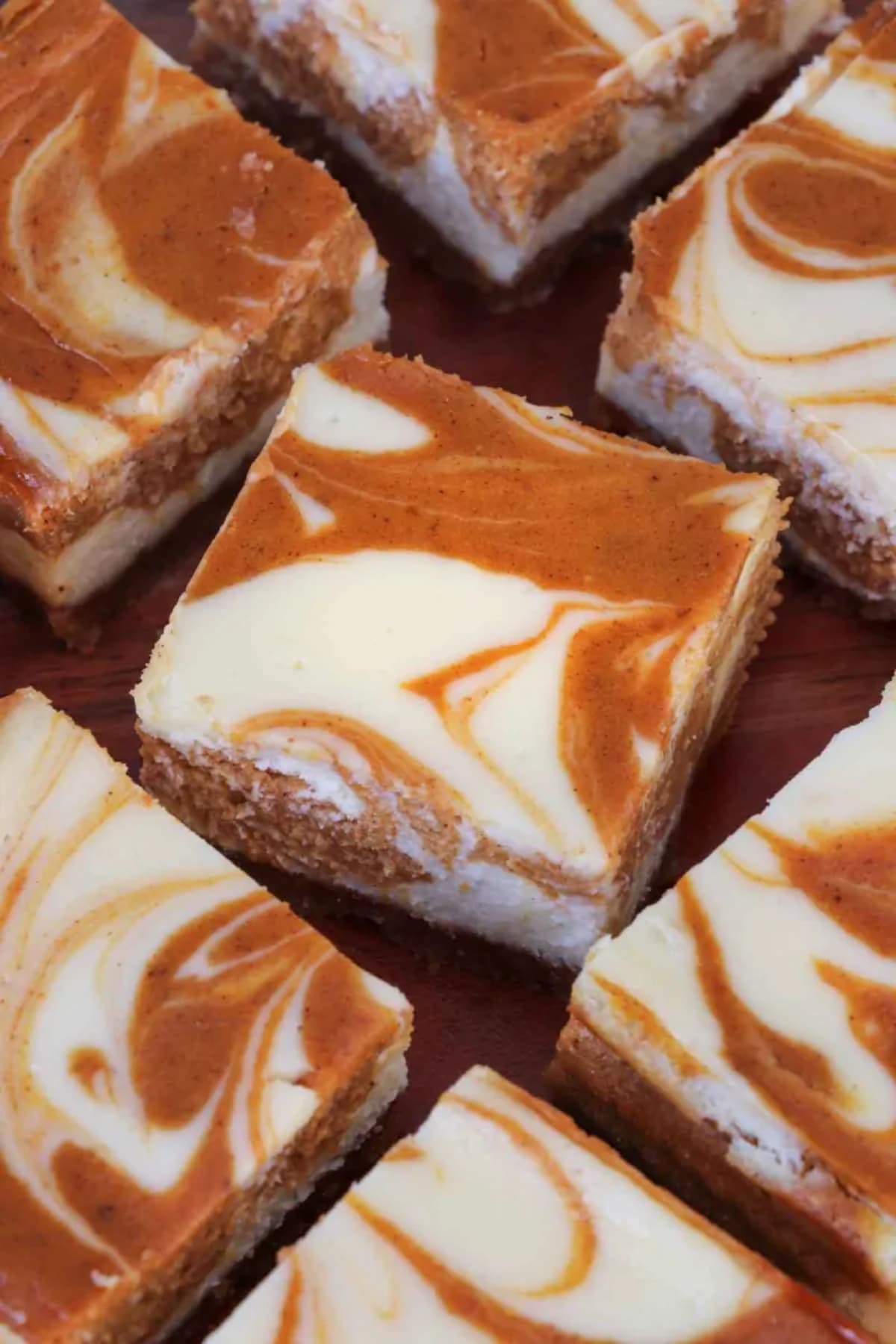 The Best Pumpkin Swirl Cheesecake Bars