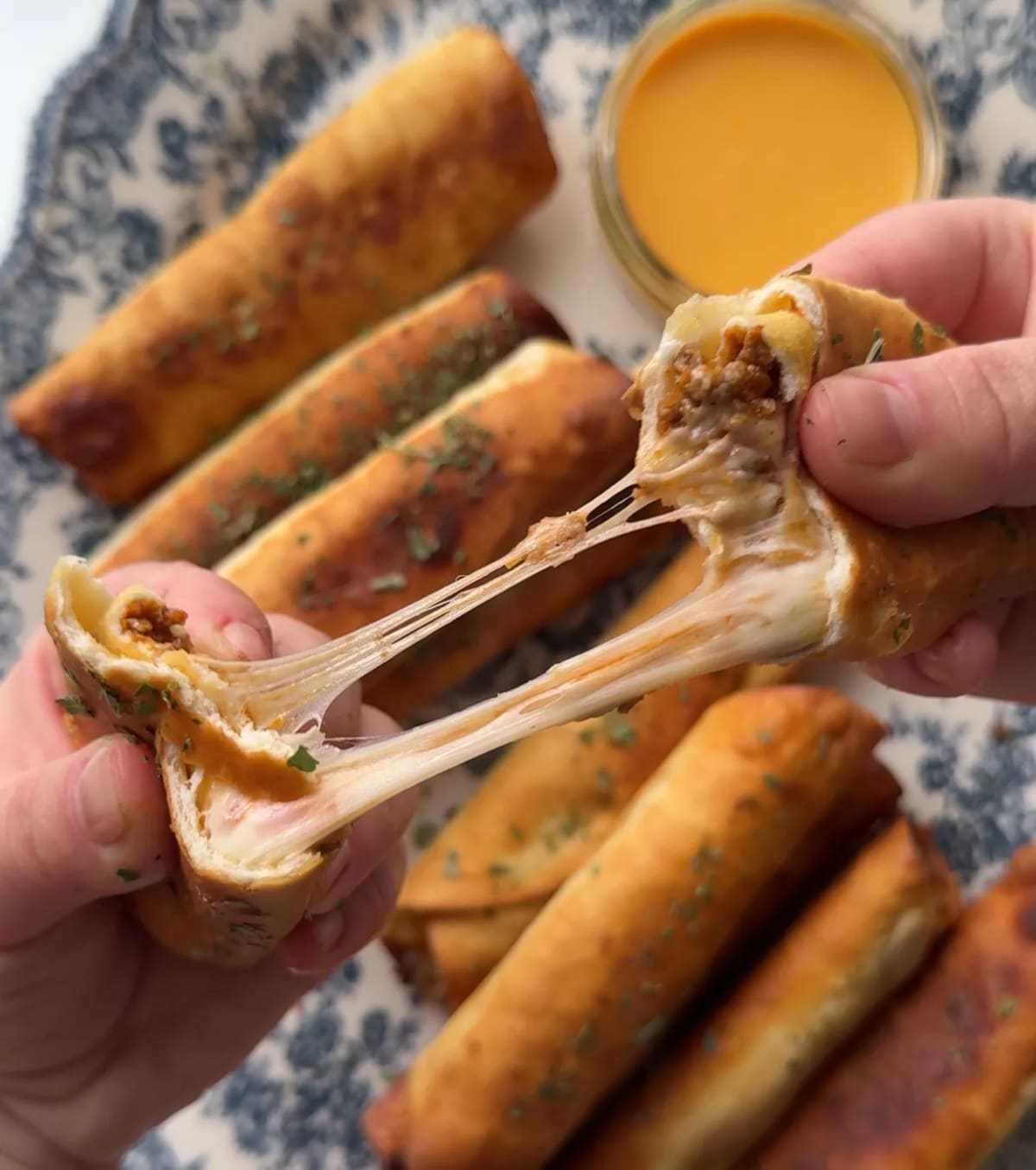Cheesy Beef Taquitos with Cheddar Sauce