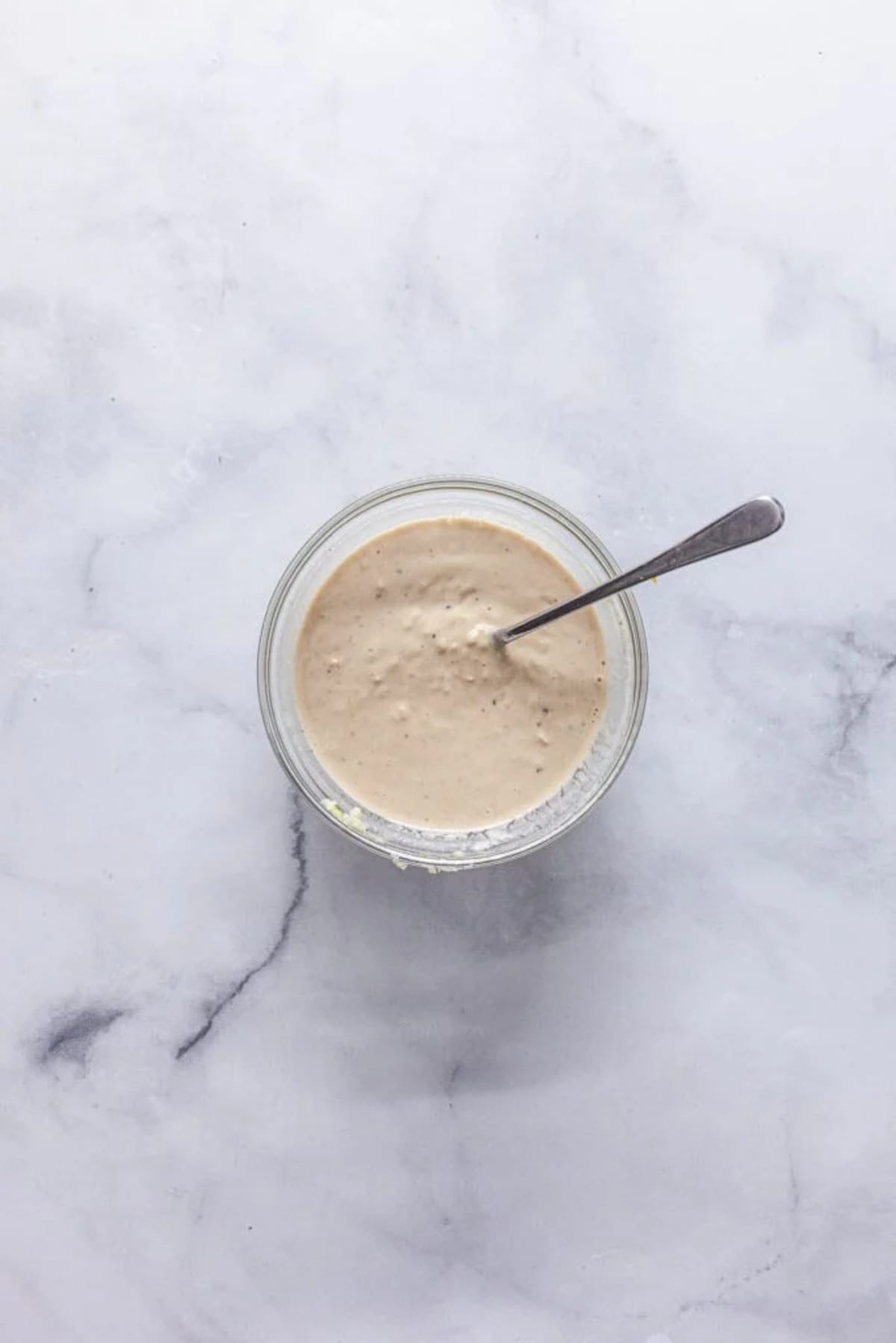 Harissa Roasted Cauliflower and Chickpeas with Tahini Sauce