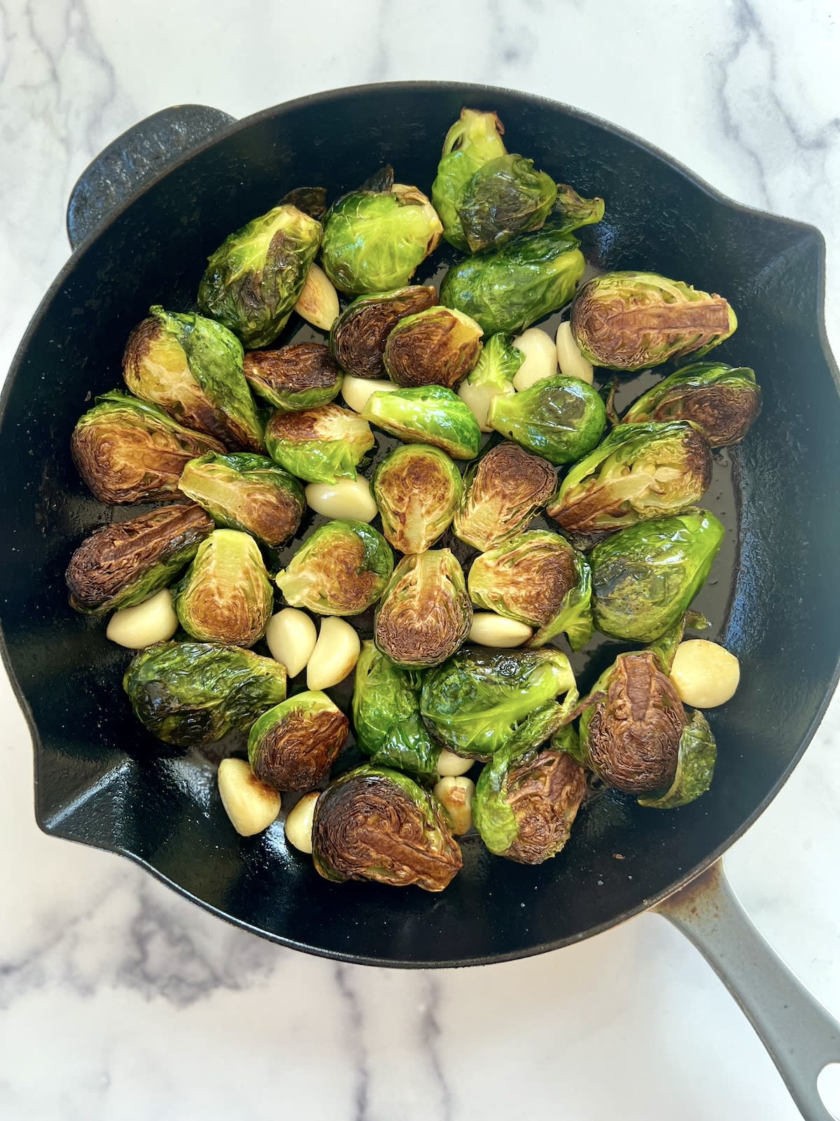 Cast Iron Brussels Sprouts with Pomegranate and Garlic