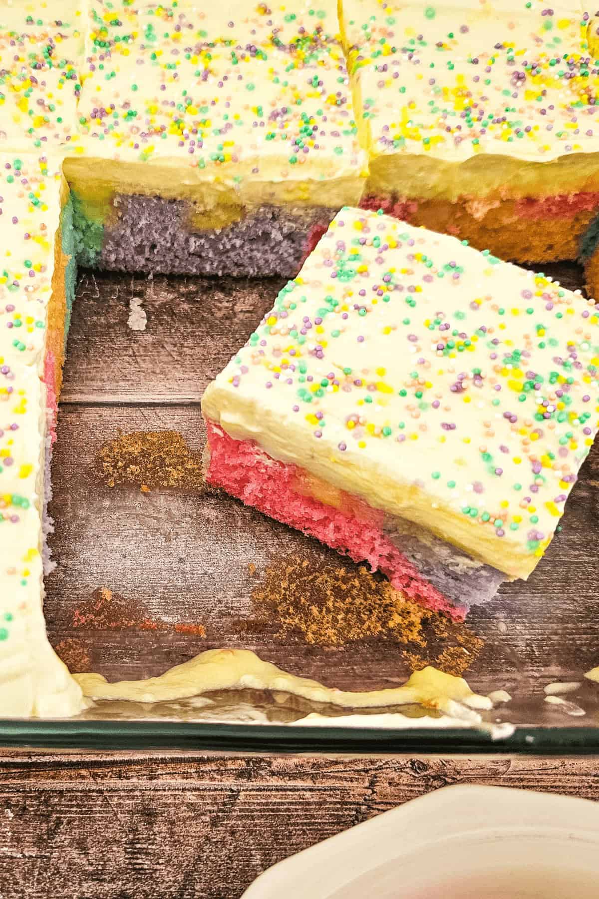 Rainbow Pudding Poke Cake