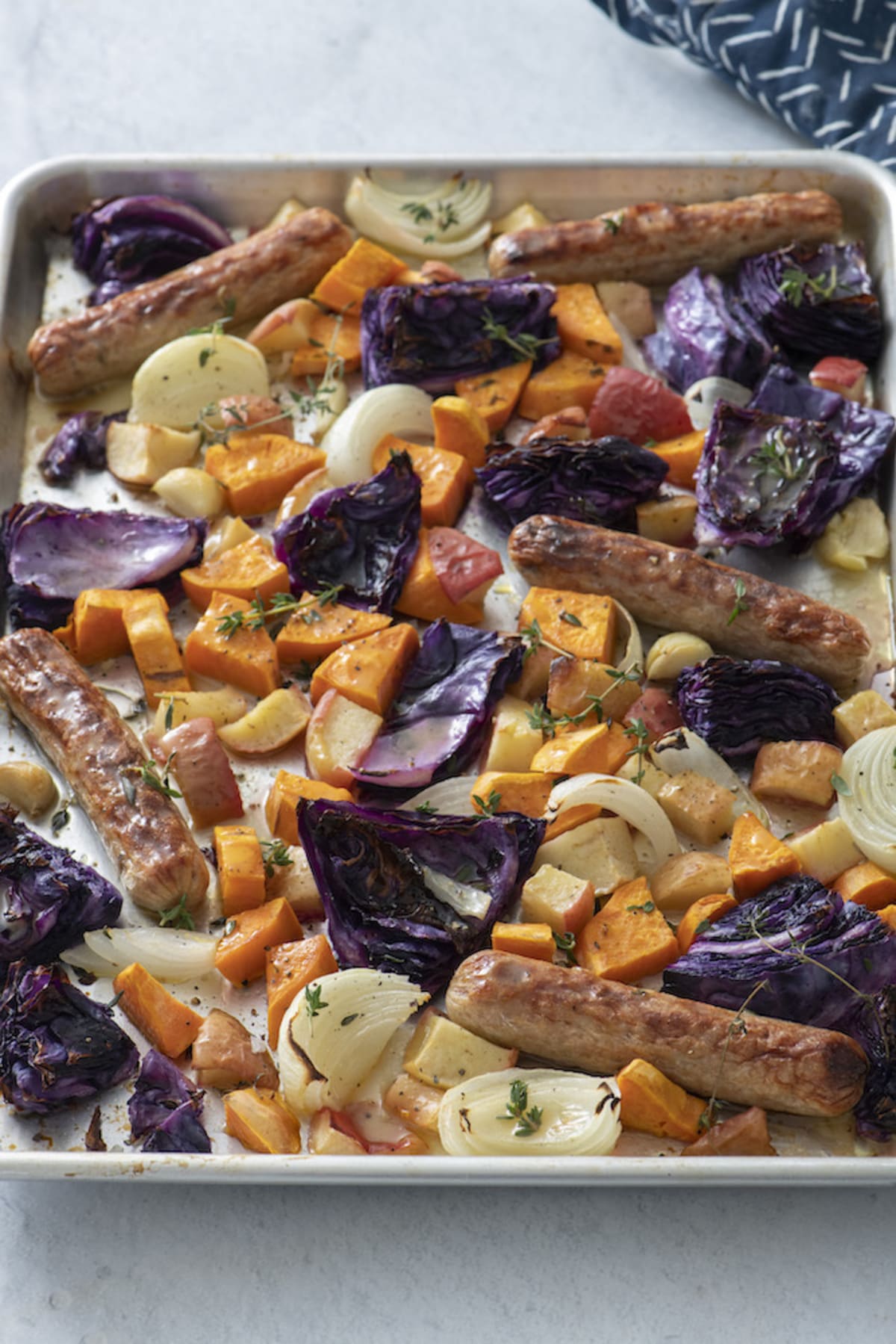 Sheet Pan Sausage with Cabbage and Apples