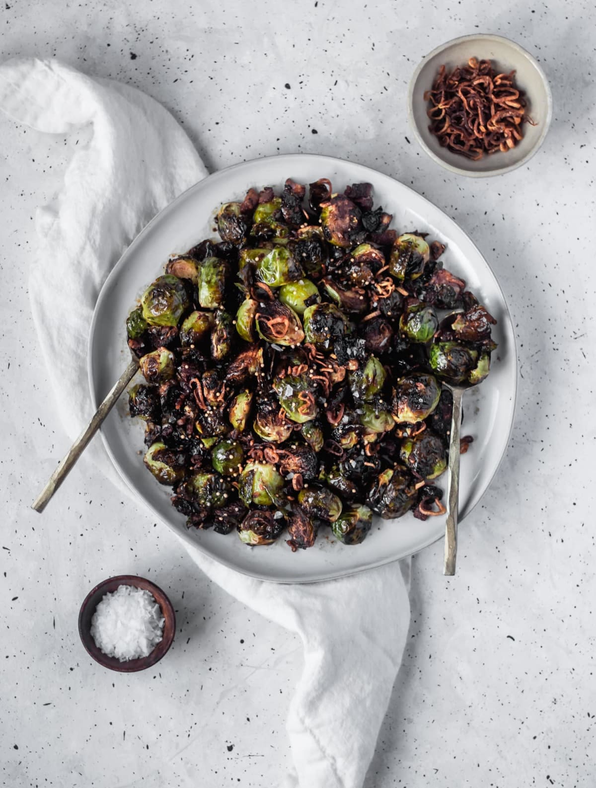 Crispy Brussels Sprouts With Fried Shallots, Bacon, & Dijon Vinaigrette