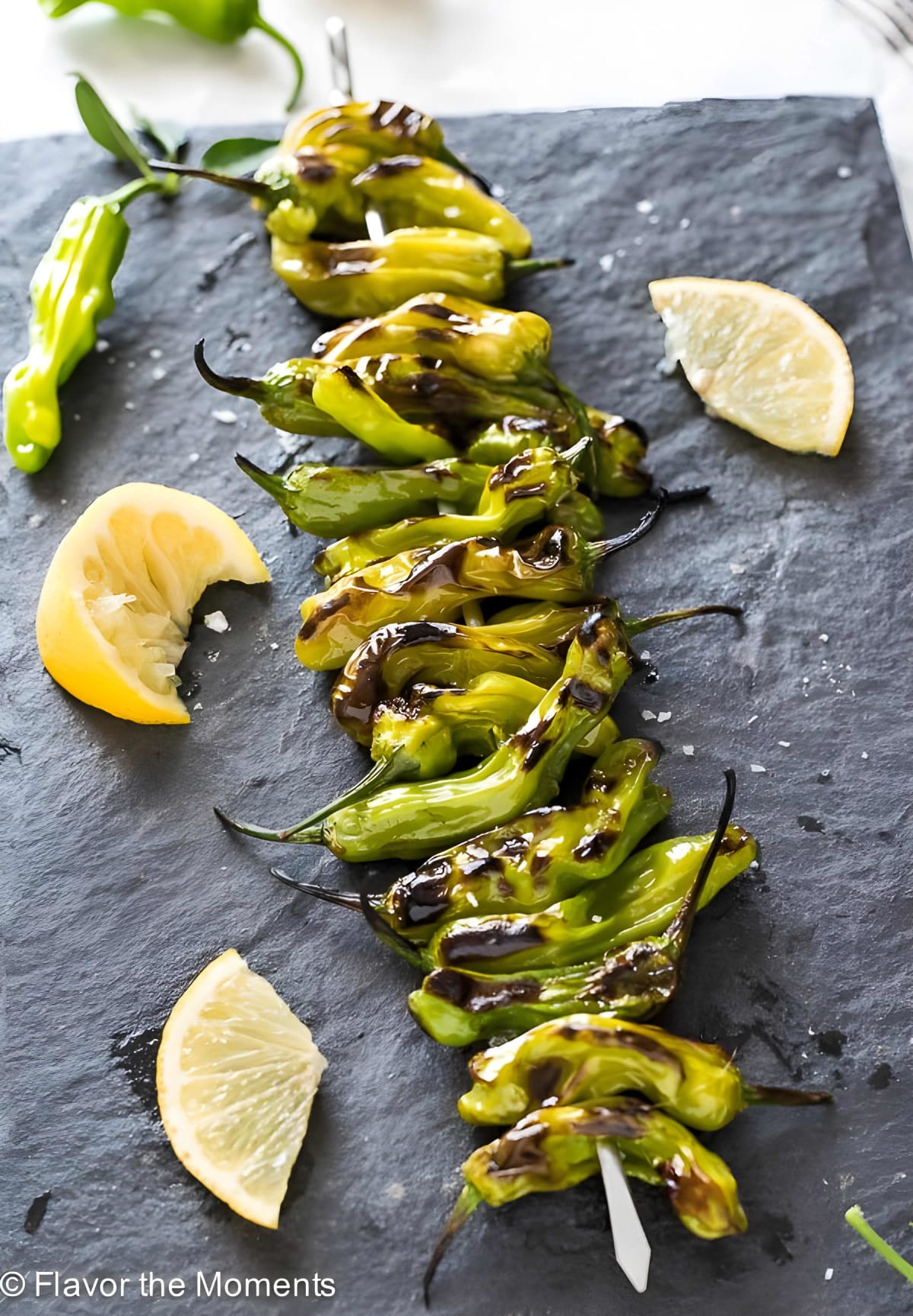 Grilled Shishito Peppers with Lemon and Sea Salt