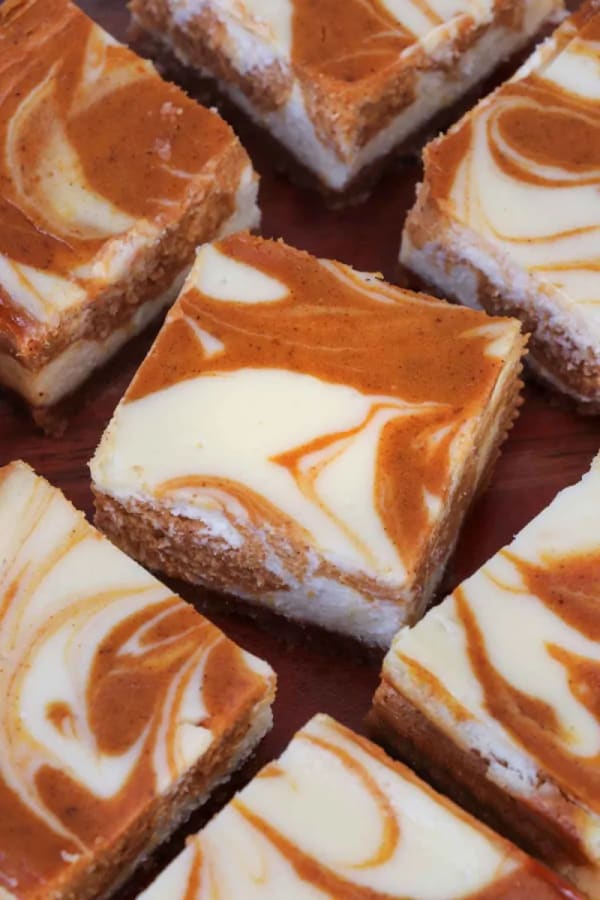 The Best Pumpkin Swirl Cheesecake Bars cover